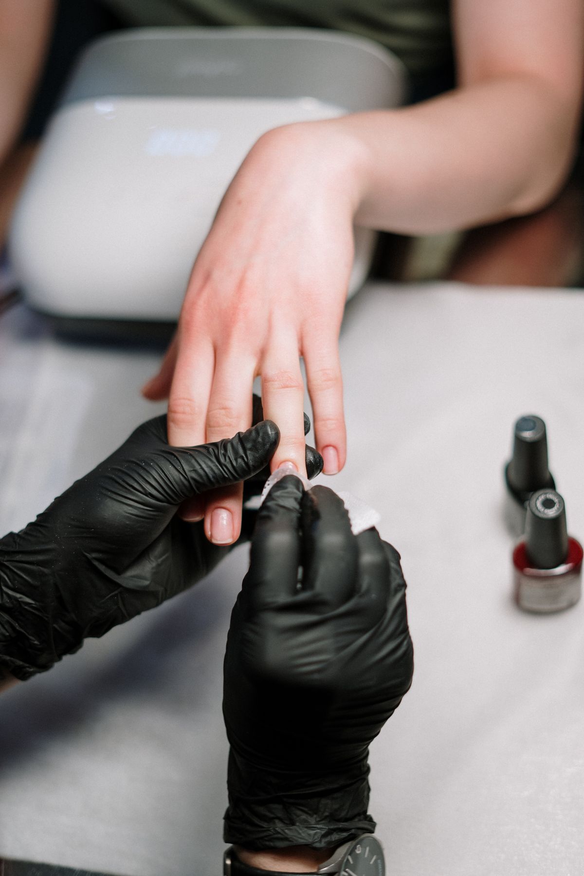 Manicure application at Divina Nail Lounge, Round Rock